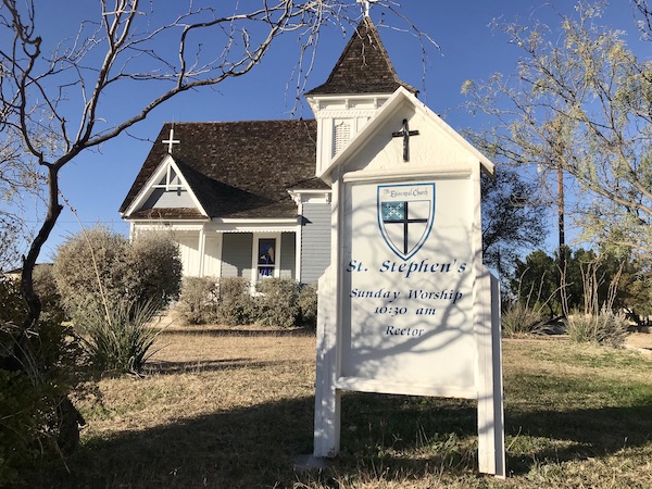 A white building that was the church at Fort Stockton Texas
