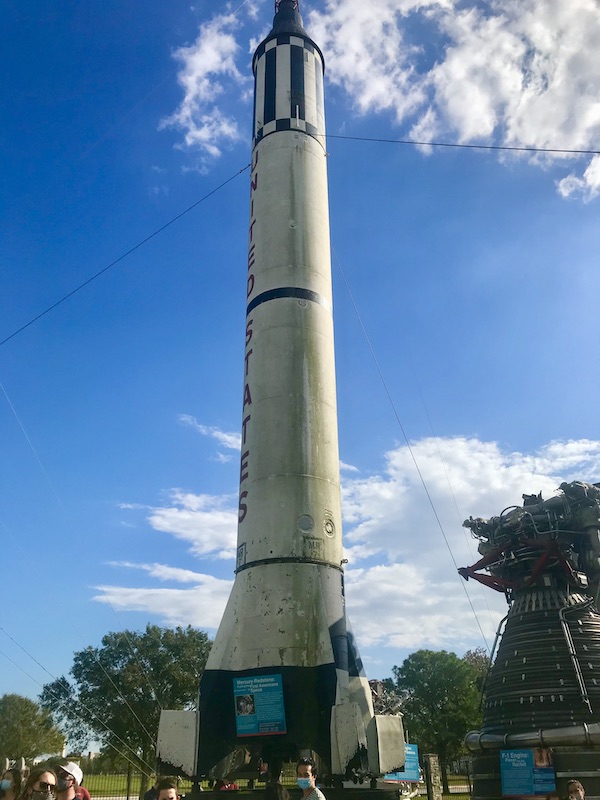 A huge white rocket ship at the NASA Space Center Houston