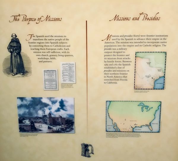 A large sign with information helps us Remember the Alamo