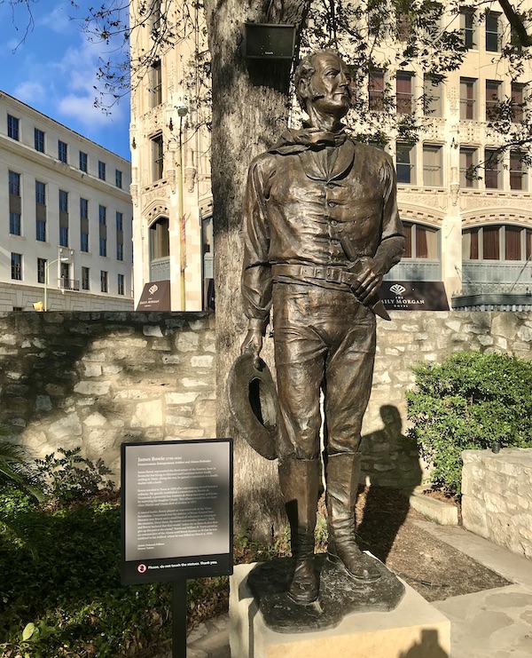 A bronze statue of a soldier helps us Remember the Alamo