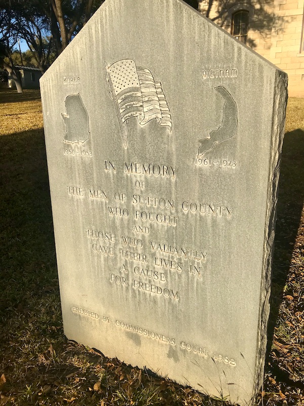 A ston marker memorial in courthouse Square Sonora Texas