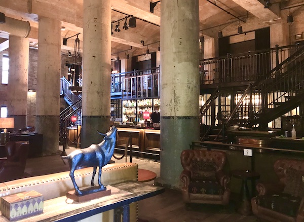 An historic hotel lobby with columns in The Pearl in San Antonio
