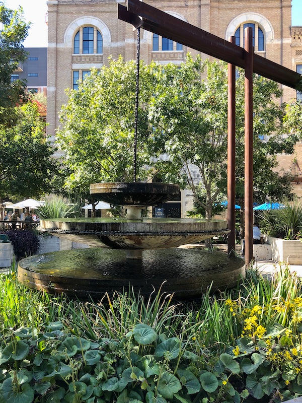 A fountain and lots of trees in The Pearl in San Antonio