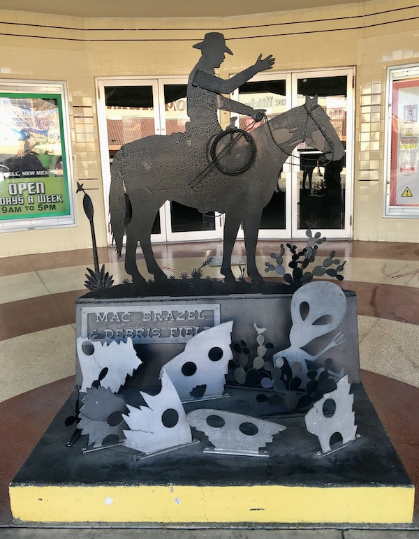 A sculpture of a man on horseback and alien faces prove that Aliens Abound in Roswell New Mexico