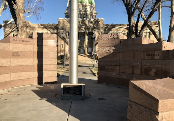 Two curved walls form a war memorial at a place where Aliens Abound in Roswell New Mexico