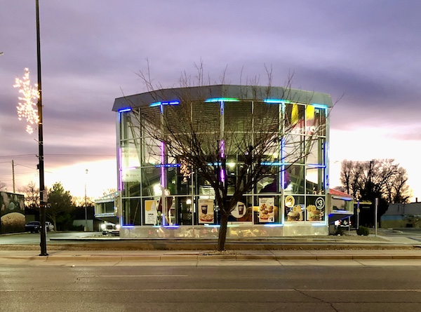 A glass and color changing light building looks like it's from outer space where Aliens Abound in Roswell New Mexico