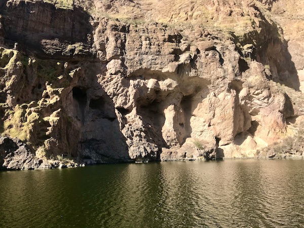A canyon lake with a rocky mountain that has the shape of a mastodon along the #Locavores #WeLoveFood #RestaurantOwner #Foodies #Chef #FoodTruck #Cafe #Bistro #Eatery #TheTravelingLocavores #Recipes #FoodStories #Cooking #Wanderlust #Traveling