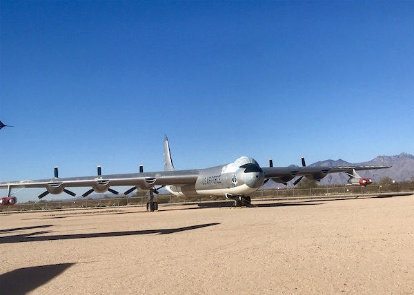 A huge Air Force plane with propeller engines on display at the Pima Air and Space Museum