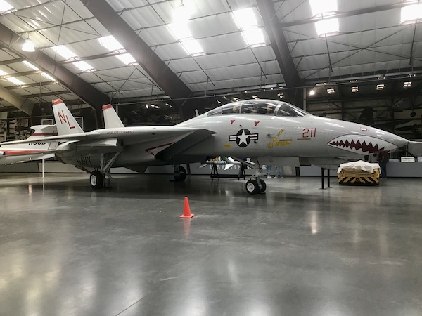 A gray F-14 fighter jet on display at the Pima Air and Space Museum