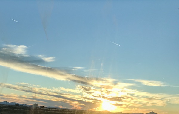 The sun going down with a beautiful display of clouds, sky and light on our way to Rincon Country East RV Resort Tucson AZ
