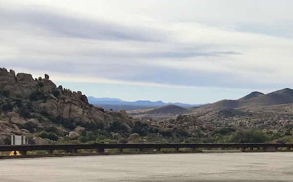Mountains in the distance viewed from a parking lot on our way to Rincon Country East RV Resort Tucson AZ
