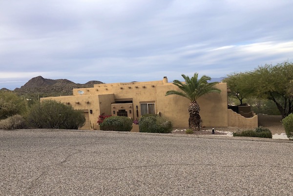 A tan stucco Mexican style home on our ride back from Sonoran Desert Museum