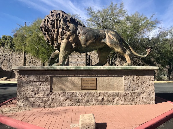 A stone platform with a huge bronze sculpture of a male lion just before we got to the Sonoran Desert Museum