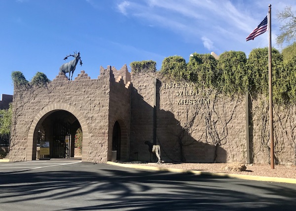 A large stone building with wild animal sculptures just before we got to the Sonoran Desert Museum