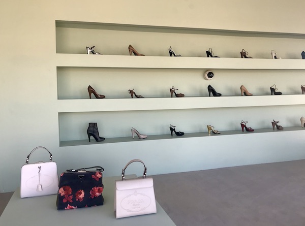 A large display of shoes and bags a few miles past The Waterstop Marfa Texas