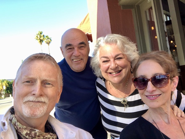 A man with a white beard, a bald man, a woman with silver hair and a woman with dark hair and sunglasses in Beautiful Redlands California