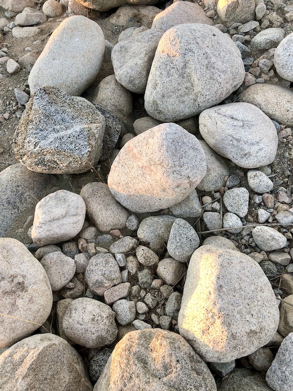 Several grey rocks and pebbles in Beautiful Redlands California
