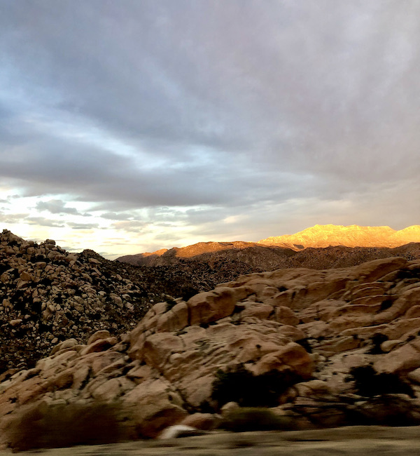 California Here We Come, mountain with bright yellow snow cap created as the sun set.