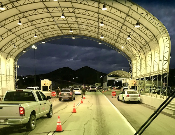 California Here We Come, inside a tunnel with lots of cars.