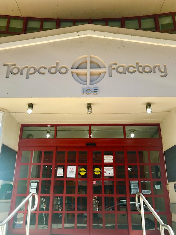 The entry to The Torpedo Factory with red doors en route Coast to Coast We Did It!