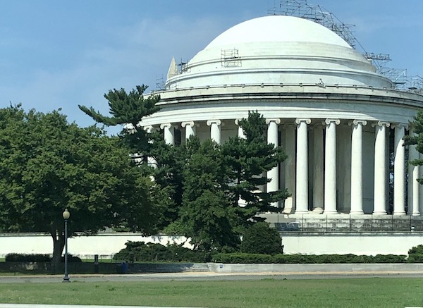 A large white round building with dome and pillars en route Coast to Coast We Did It!