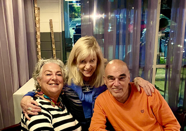 Two woman and a man at a restaurant en route Coast to Coast We Did It!