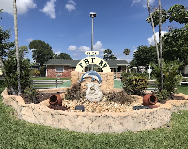 The entrance to an RV park which was our first stop on our trip Coast to Coast We Did It!