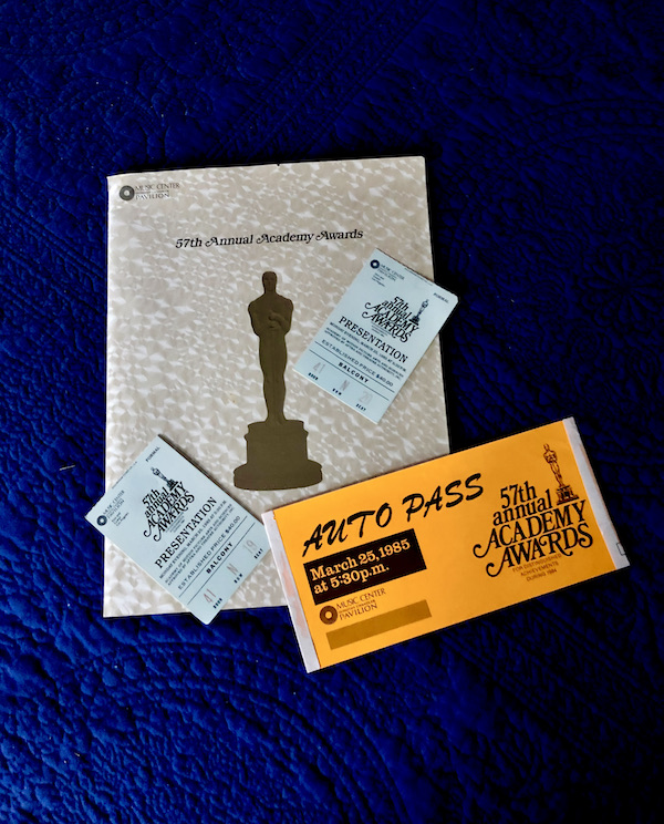 An Oscar Awards program with tickets, and parking pass on a navy background from A Day in LaLa Land