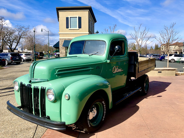 A very old mint green pickup truck at Oliver's Market on A Day with Friends in Windsor California