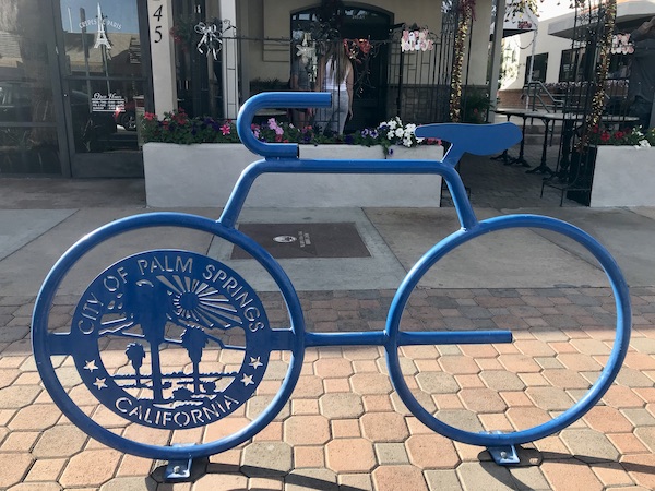 A blue bicycle sculpture welcomes you to Great Shakes in Palm Springs California