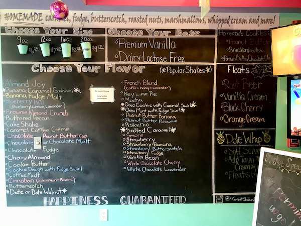 A blackboard menu of various milkshakes at Great Shakes in Palm Springs California