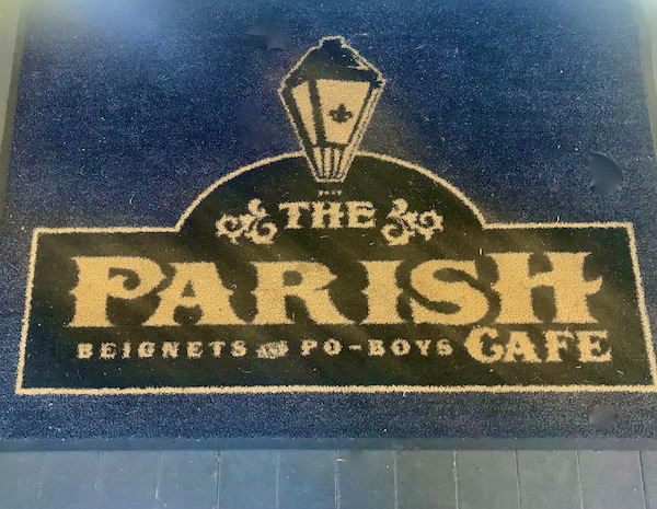A floor mat at the entry to The Parish Café a restaurant that offers A Taste of New Orleans in Healdsburg CA