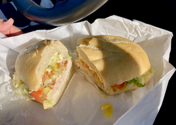 A sandwich on an Italian roll with deli meat, tomato and lettuce Petaluma to Point Reyes California