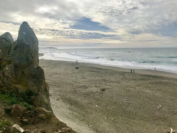 Sand, ocean and tall rocks at Sonoma Coast State Beach