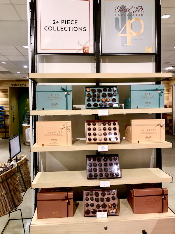 Shelves with various gift boxes of chocolates at Ethel M's, another of the 15 Best Free Attractions Las Vegas NV