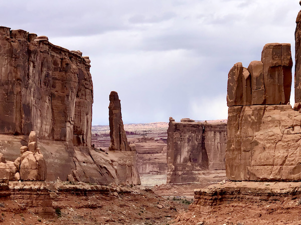 Red rock mountains with tall pillars of stone at Arches National Park Moab Utah
