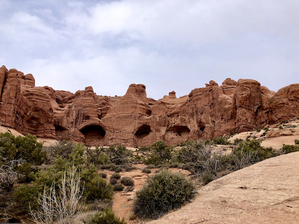 Red rock mountains with lots of arches at Arches National Park Moab Utah