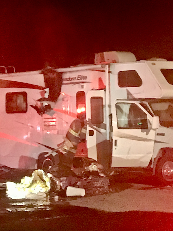 A fire damaged RV with interior items on the ground outside after dinner at Coyote Sonoma in Healdsburg CA