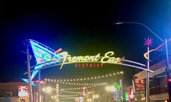 Sign for Fremont Street Experience Las Vegas NV says Fremont East with a martini in neon.