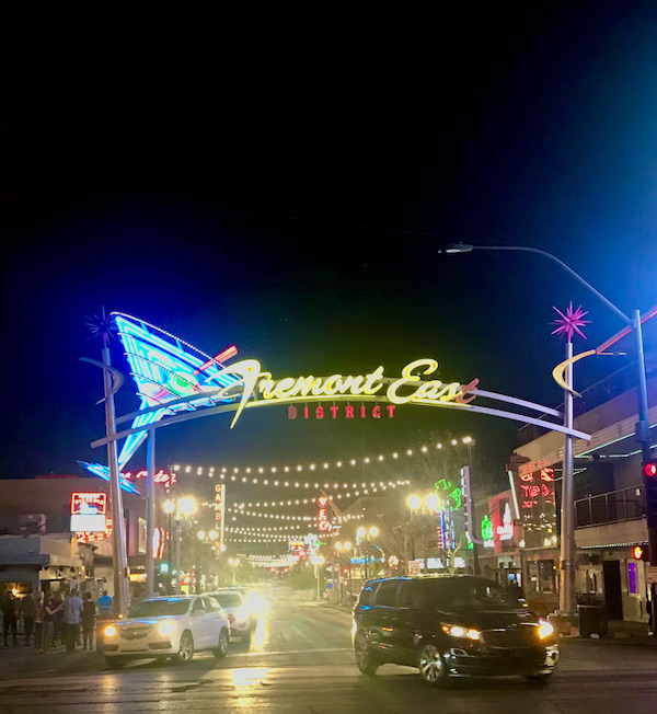 Sign for Fremont Street Experience Las Vegas NV says Fremont East with a martini in neon.