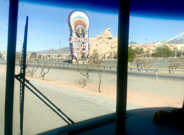 A large sign for a casino that looks like a Native American in a feather headdress on our way to Fremont Street Experience Las Vegas NV
