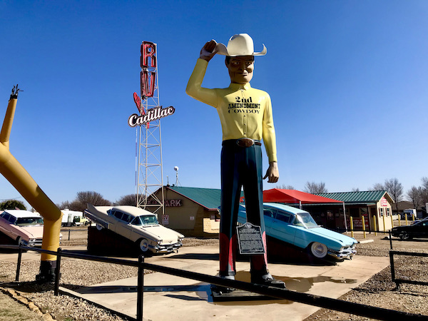 A huge sculpture of a cowboy with Cadillacs behind it was a Highlights of Amarillo Texas
