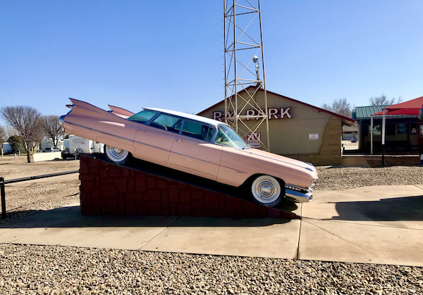 An old pink Cadillac on a ramp is another of the Highlights of Amarillo Texas