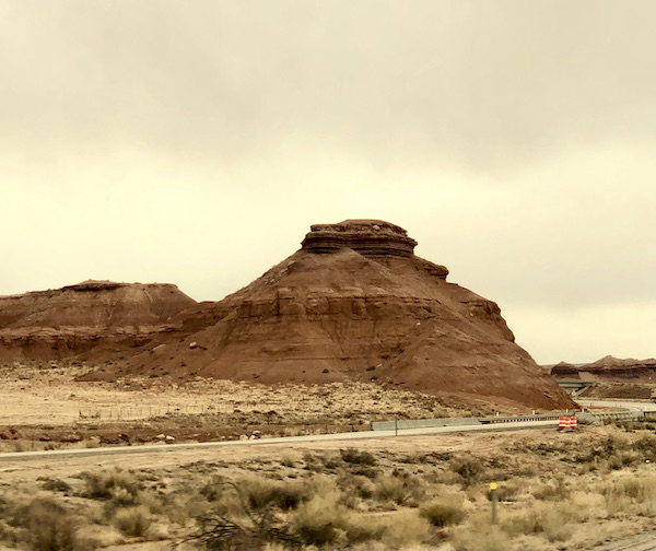 Deep hive shaped red rock mountains and sand along our Scenic Drive to Moab Utah