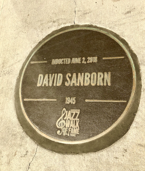 A bronze and gold round plaque at the American Jazz Museum Kansas City MO