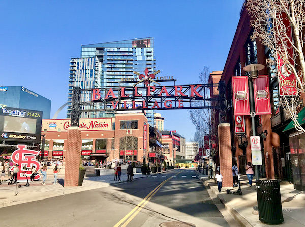 Buildings in Downtown St. Louis Missouri with a large sign letting you know you are in Ballpark Village.