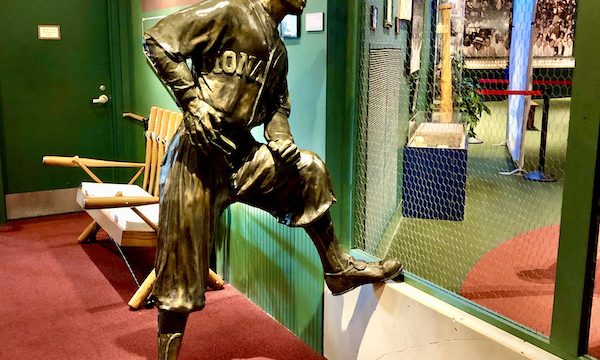 A bronze sculpture of a baseball player at the Negro Leagues Baseball Museum