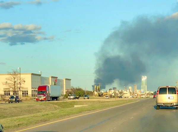 On our way to we saw smoke from a building that was on fire.