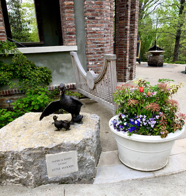 A bird sculpture and planters at the Cheekwood Estate Nashville TN