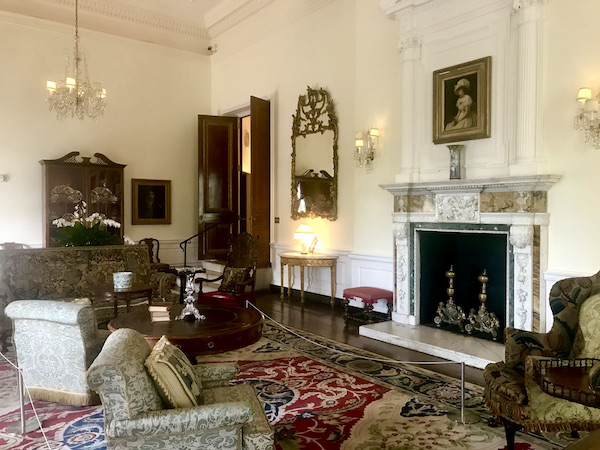 Part of the Drawing Room at Cheekwood Estate Nashville TN with a fireplace and comfortable chairs.